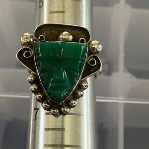 Vintage Mexican (Mayan?) carved green chalcedony face on sterling silver ring.